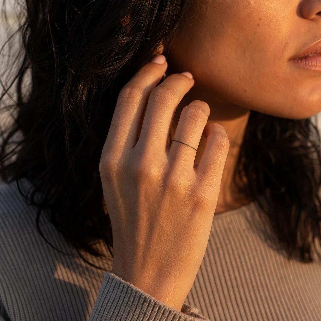 women's finger tattoo minimalist thin ring, realistic photo on skin