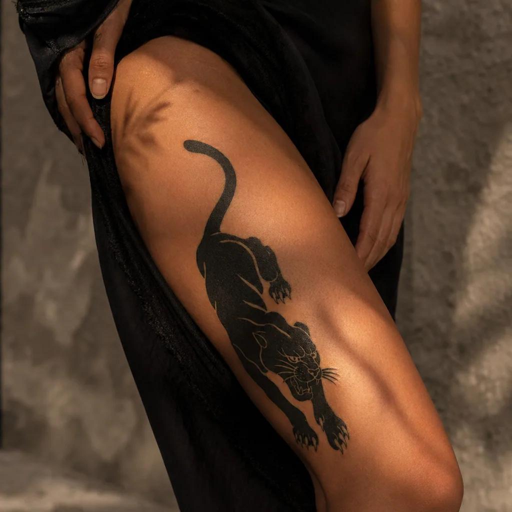 thigh-tattoo blackwork panther